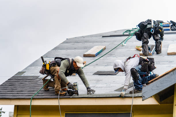 Professional Gutter Installation technician working in Marion, SD